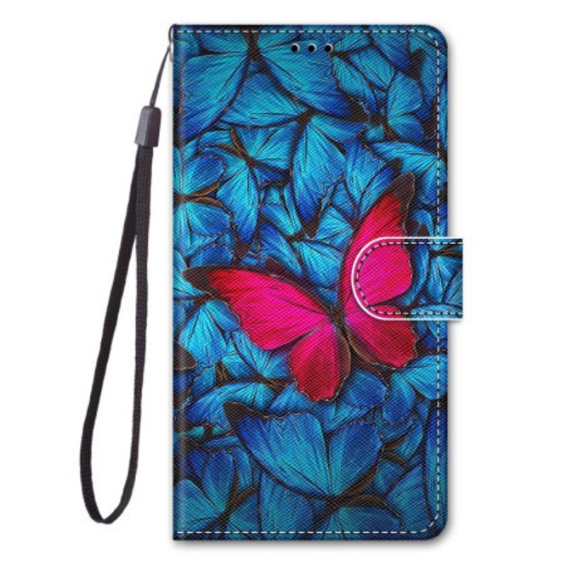 Etui Folio do Xiaomi 13 Czerwony Motyl Niebieskim Tle