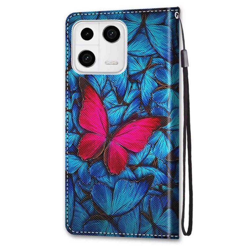 Etui Folio do Xiaomi 13 Czerwony Motyl Niebieskim Tle