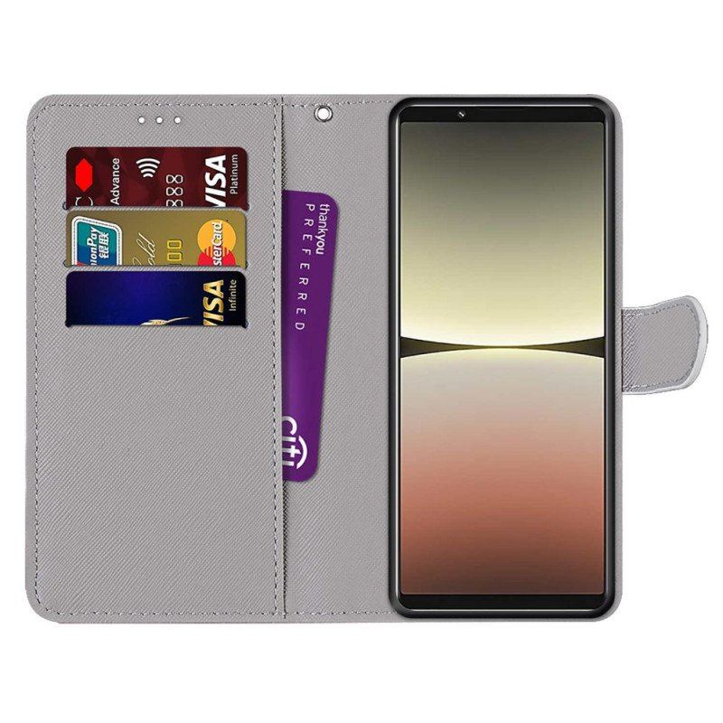 Etui Folio do Sony Xperia 5 IV Czerwony Motyl Niebieskim Tle