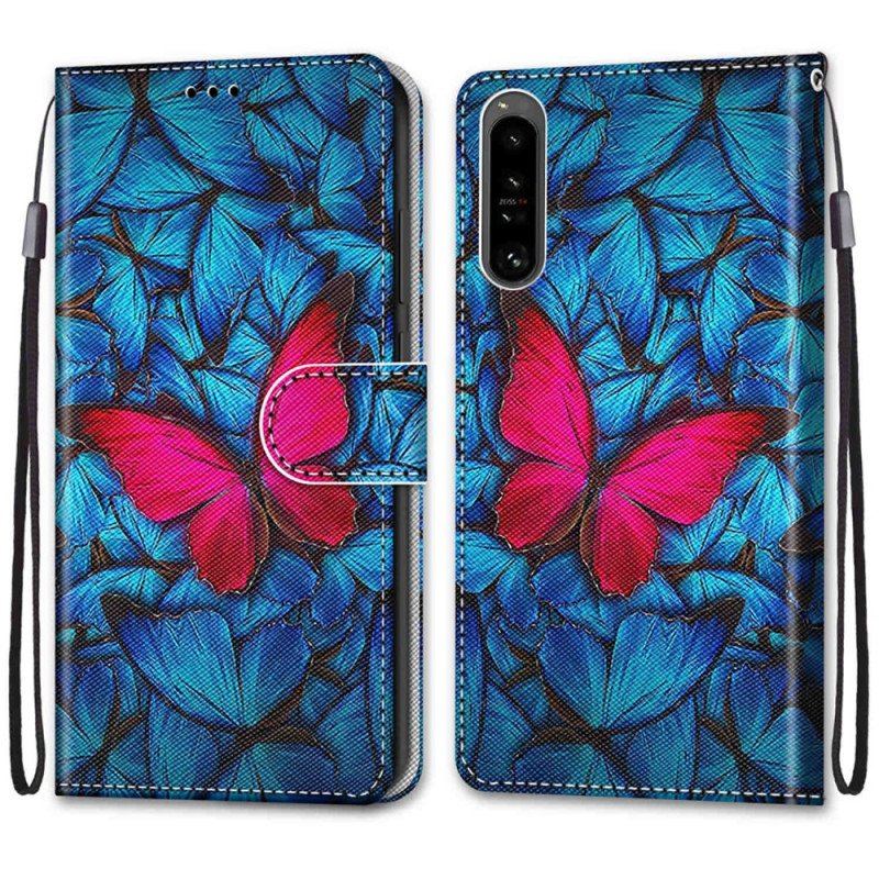 Etui Folio do Sony Xperia 1 IV Czerwony Motyl Niebieskim Tle