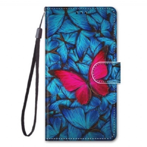 Etui Folio do Samsung Galaxy S23 Ultra 5G Czerwony Motyl Niebieskim Tle